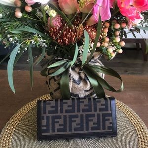 Fendi wallet—classic print, lots of slots, elegant